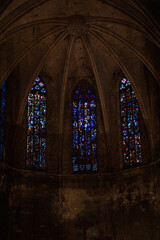 Epic ancient gothic church cathedral interior stone arch vault stained glass vertical.  © Yar