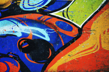 Urban graffiti art wall texture abstract colorful spray paint, distressed concrete surface and expressive street art details. Modern grunge background perfect for posters, packaging and graphic design © djjeep_design