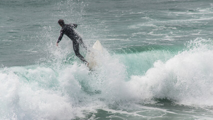 Fototapeta premium surfer in action Pacific Beach CA