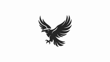 Fototapeta premium Black eagle silhouette with wings spread in flight.