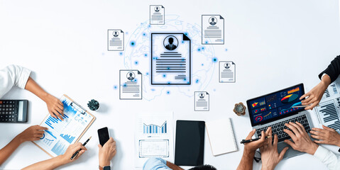 Fototapeta na wymiar Concept of global talent acquisition and hiring. Human resources department reviewing candidate curriculum vitae and resumes for a job search and workforce selection process. Fermion