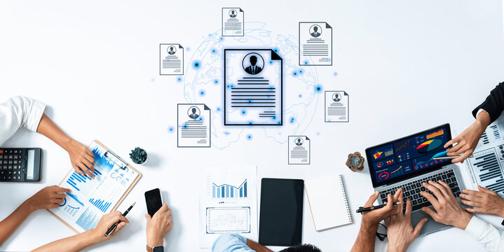 Concept of global talent acquisition and hiring. Human resources department reviewing candidate curriculum vitae and resumes for a job search and workforce selection process. Fermion