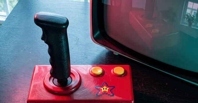 Vintage Arcade Joystick and Retro Monitor Gaming Setup