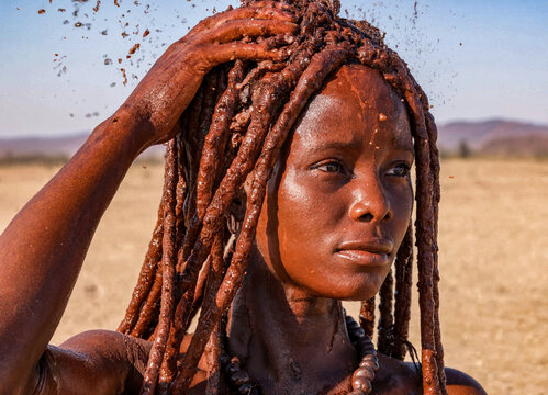 Himba Woman Portrait with Traditional Otjize Red Ochre Paste