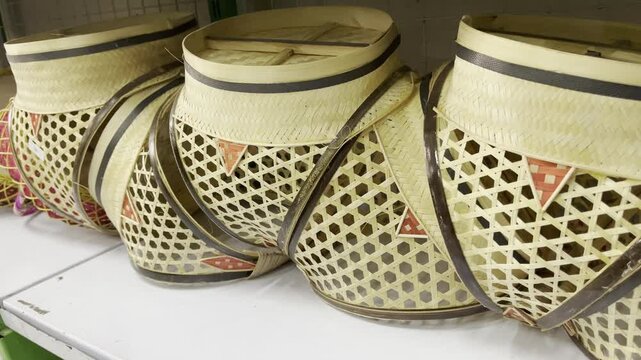 Traditional Indonesian bamboo woven baskets with unique patterns for ethnic food storage