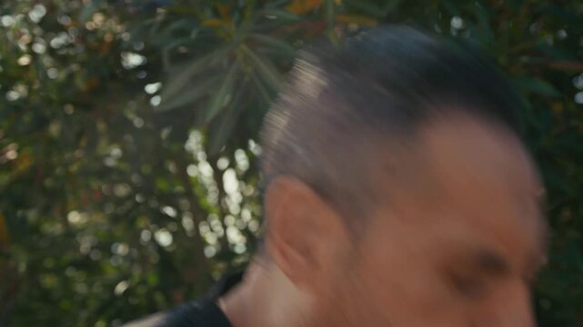 man chewing something bitter and feeling disgusted