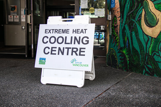 View of sign Extreme Heat Cooling Centre at the entrance of Denman Community Centre