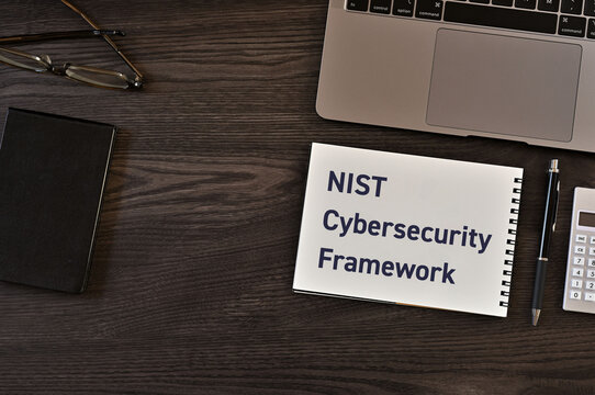NIST Cybersecurity Framework documentation on desk workspace &mdash; ideal for IT security and compliance articles