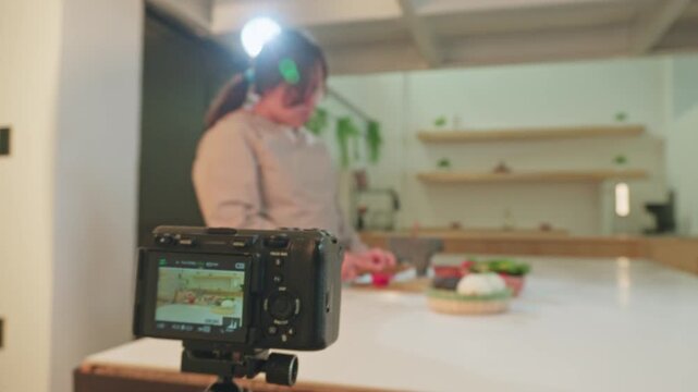 Food blogger recording a cooking tutorial video