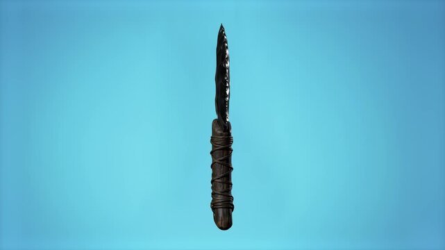 3D model of a primitive obsidian stone knife or spearhead with wrapped handle isolated over a light cyan background. Ideal for prehistoric history documentaries, stone age survival content, ancient we