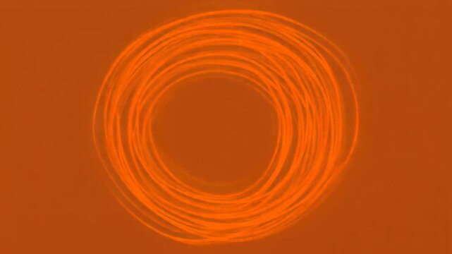 Hand-Drawn Vibrant Orange Line Rapidly Creating a Circular Outline with Transparent Background, Animated Motion Graphic Element
