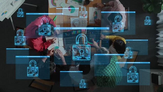 Collaborative Work on Data Security Strategies with Visual Data Representation and Digital Lock Symbols Overlaying Team Discussion. Entropy.