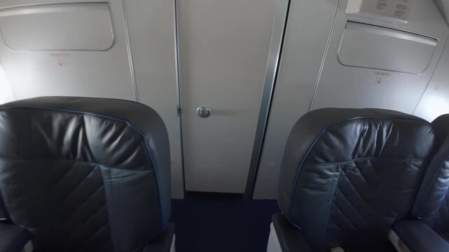 Interior view of the empty flight crew rest area with beds on board a cargo airplane