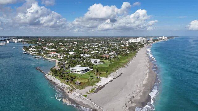 The beach and north jetty along Jupiter Inlet in the town of Jupiter in Palm Beach County, Florida.