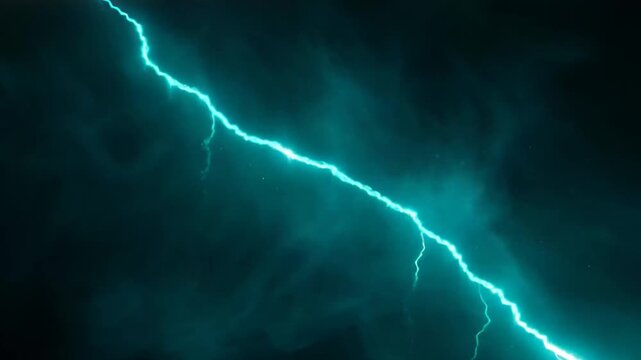 Electric blue lightning bolt in dark stormy night sky with clouds.