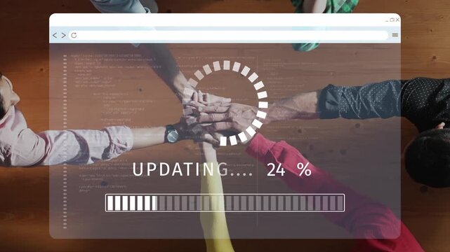 A scene depicting a collaborative workspace where a group of people engage in teamwork while a software update progresses on a laptop screen, reflecting innovation and productivity. Raster