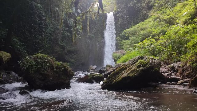 A very beautiful and refreshing view of the waterfall in the Mount Rinjani National Park tourist area, called the Mayung Polak waterfall.