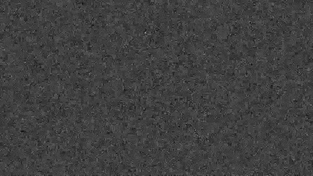 Closeup macro texture surface black speckled background seamless pattern dark particles dirt