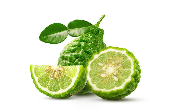 Fresh Kaffir Limes with Leaves and Slices on White Background