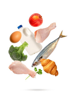 Levitation essential food including milk, egg, fish, chicken, apple, broccoli, and croissant. balanced diet concept isolated on white background.