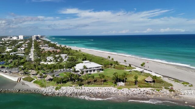 The beach and north jetty along Jupiter Inlet in the town of Jupiter in Palm Beach County, Florida. 