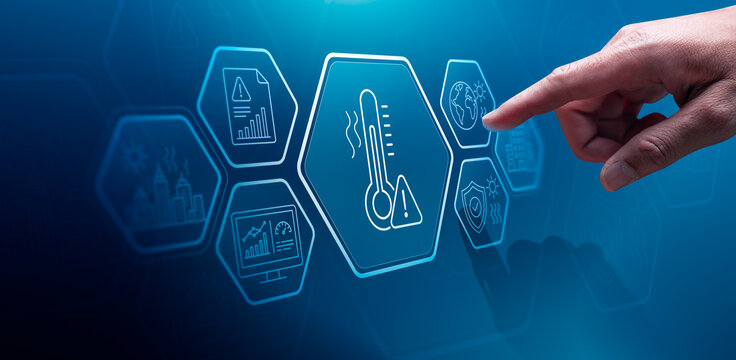 Climate risk management concept with business hand touching virtual heat warning interface showing thermometer alert global warming impact urban safety and environmental monitoring