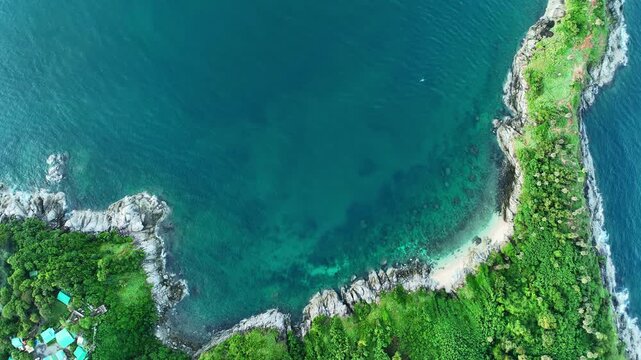 Amazing sea big waves crashing on rocks seascape, Aerial view drone 4k High quality of ocean sea background,Promthep cave in Phuket island Thailand