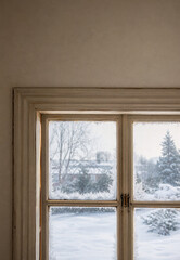 Fototapeta premium Cold Air Entering Through Old Window Frame During Winter Showing Poor Home Insulation and Energy Efficiency Problem