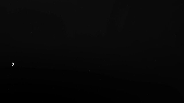 4K Dark Film Dust Overlay,Vintage grunge texture background video effect with cinematic retro grain.