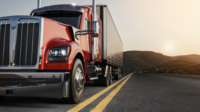 Red semi truck driving on highway at beautiful sunset