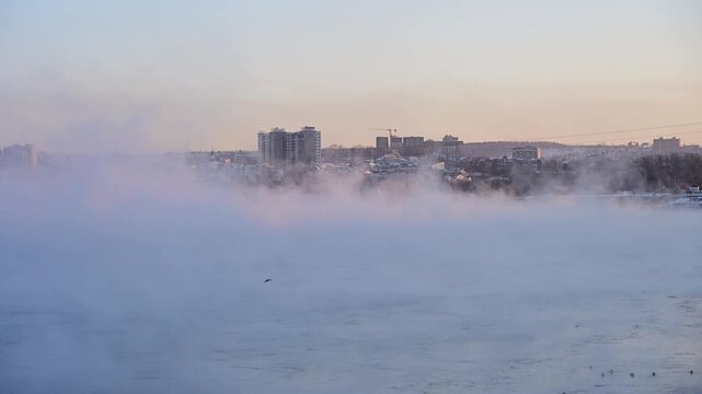 Scenery view of Angara river flows through city of Irkutsk the largest cities in Siberia, Russia during winter season. The Angara is the only river flowing from lake Baikal.