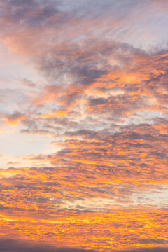 Beautiful sunset sky with fiery clouds