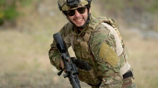 Military marksman aiming through a scoped rifle during tactical training exercise, demonstrating precision, focus and operational readiness