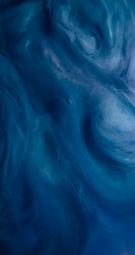 Galaxy ink. Haze flow. Blue gray underwater splash emulsion stream mix. Dissolve dye spill fluid cosmic texture abstract background.