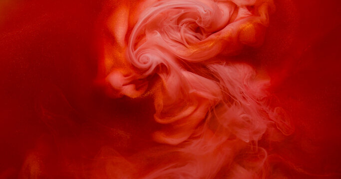 Paint vortex. Haze swirl. Red orange cloud art mix curl colorful liquid. Blur shiny abstract fluid spiral spill bright background.