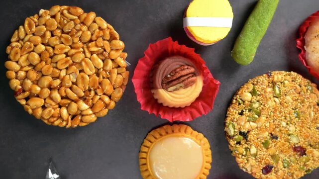 Flat lay of assorted artisanal seed bars, nuts pastries and traditional confections. Mexican food