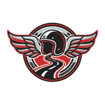 Winged motorcycle helmet emblem with winding road.
