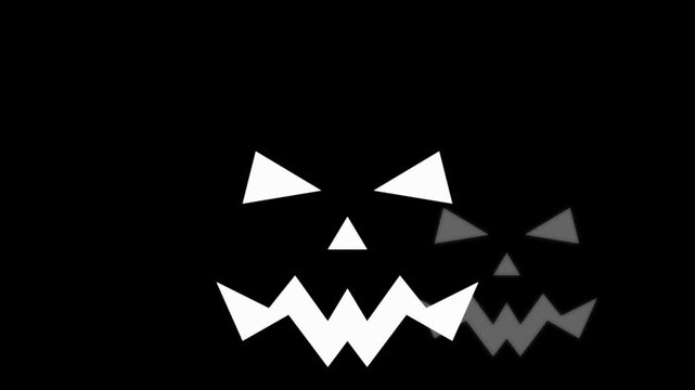 Abstract Halloween jack o lantern faces appearing on black background