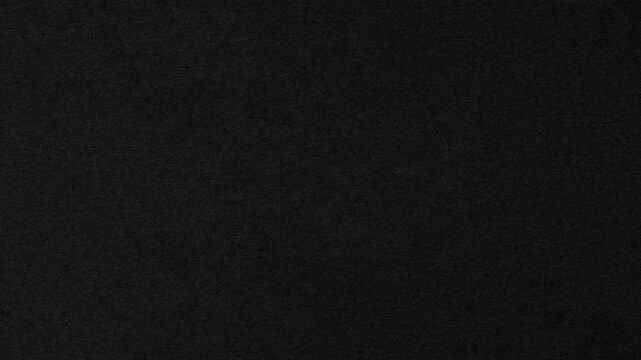 Textured black paper surface a subtle matte paper texture. Ideal for clean,
modern designs. Smooth dusty black paper sheet. Video effect 4k resolution background, grunge backdrop, black paper bg.