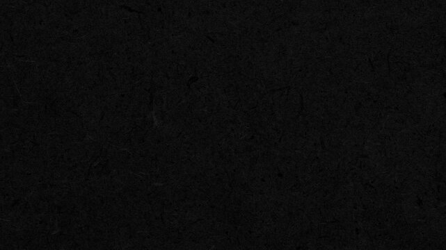 Textured black paper surface a subtle matte paper texture. Ideal for clean,
modern designs. Smooth dusty black paper sheet. Video effect 4k resolution background, grunge backdrop, black paper bg.
