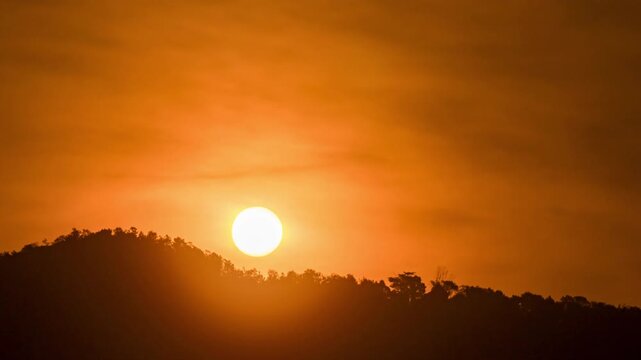 Beautiful morning sunrise time-lapse, clear sky and bright sun light coming up.