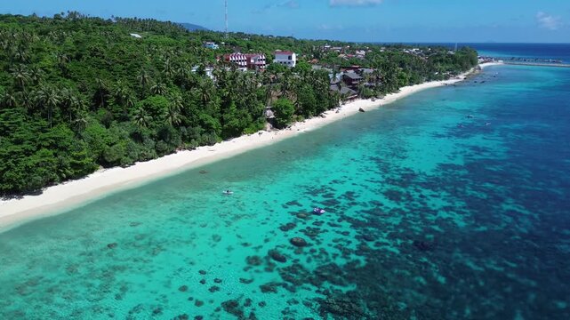 Beautiful Tropical Coastline with White Sandy Beach and Palm Trees from Above in Sabang, Aceh, Indonesia