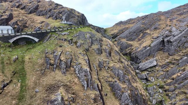 Ireland Epic Locations drone rising revealing the top of The Healey pass and the decent to Kerry epic road trip on the wild Atlantic way