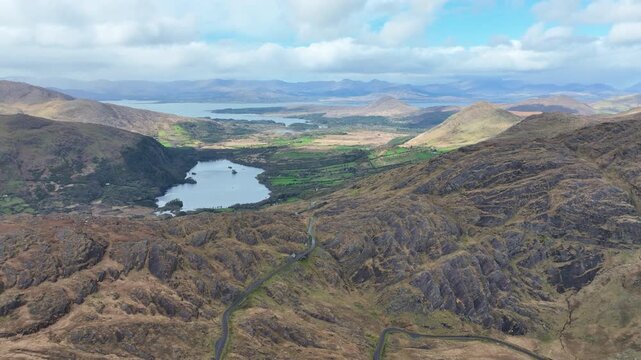 Ireland stunning aerial of Healey Pass on The Cork Kerry border looking over Kenmare Bay epic