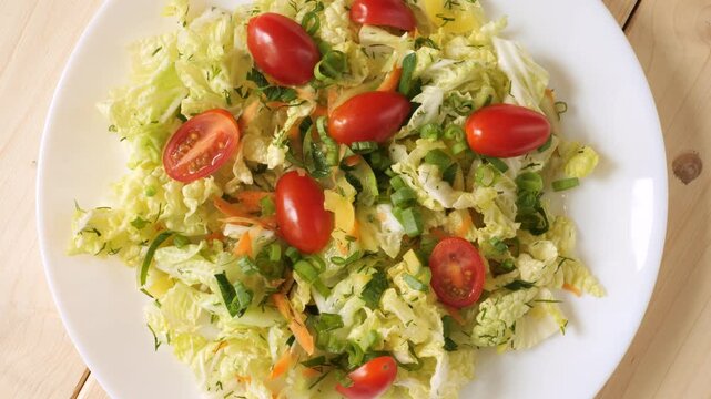 Fresh vegetable salad with cherry tomatoes rotating