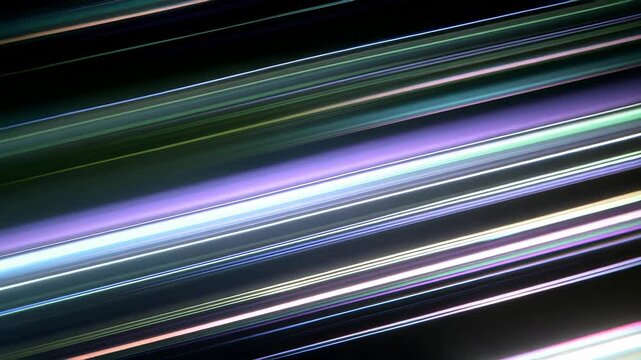 Abstract glowing light streaks in vibrant neon colors create a futuristic and dynamic visual effect. Diagonal lines intersect on a dark background, evoking speed and modern technology