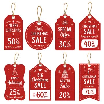 Red Christmas sale paper tags vector set with different shapes and hand drawn elements in red color hanging with discount text for christmas holiday shopping promotion. Vector illustration.
