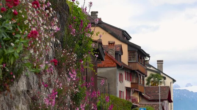 Traditional swiss chalets and flowers in Montreux, Switzerland