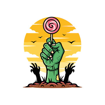 Green zombie hand holding a pink lollipop against sunset.