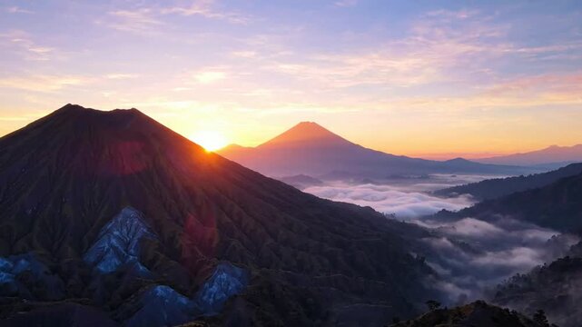 Sunrise over mount bromo volcano, indonesia: volcanic landscape with morning mist and golden sunlight for travel and nature media